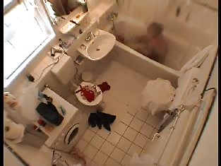 Hidden Camera Catches a Girl in the Bathroom